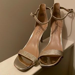 Gently used 3-1/2 stiletto heel Size 12 Light Gold Glitter
